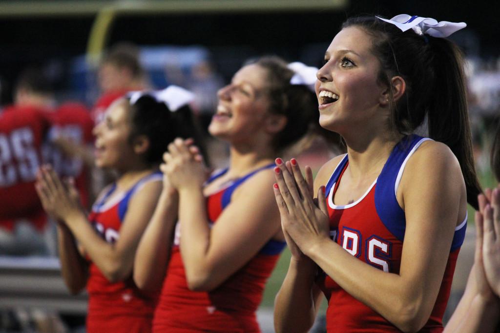 JV cheerleader sophomore Lindsey Livitz cheers on the JV Red team in its game against Cibolo Steele on Sept. 19.