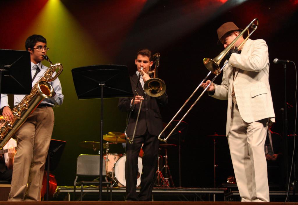 Freshmen Michel Gonzalez and Rohan Pillay play with guest performer Mike Mortacai during the Jazz Band concert on May 9.