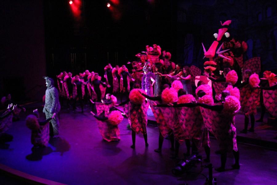The dragon dances and sings during the performance of Shrek.