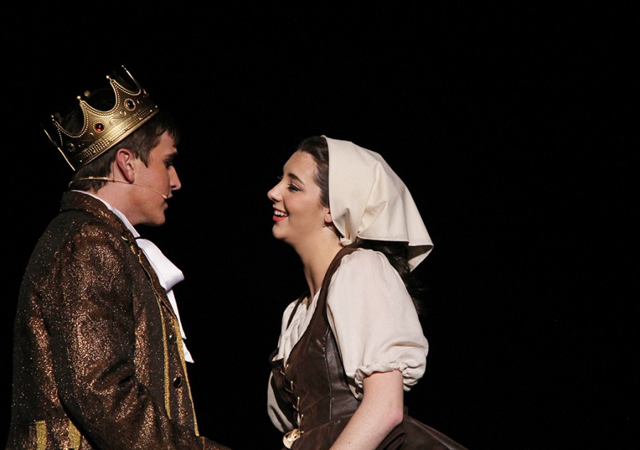 Seniors Patrick Gilligan and Taylor Thomas sing to each other during the dress rehearsal of Cinderella on Feb. 3.