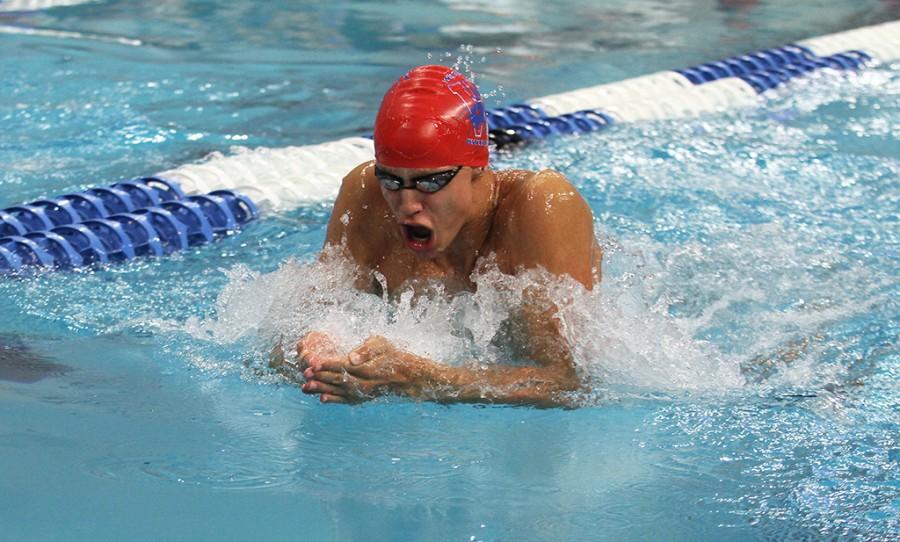 Swim team member sophomore Matthew Willenbring swims the Boys 100 Yard Breaststroke at the Swimming and Diving State Campionships on Feb. 20. Matthew placed first in the category and helped the boys team to place second in the state.