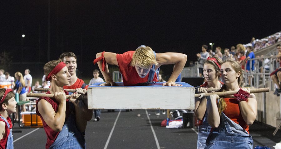 Junior Jake Breedlove does 35 pushups after the final touchdown against Bowie on Sept. 16.
