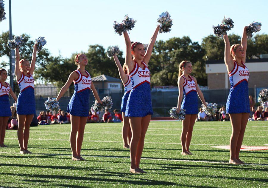 The Starsteppers  perform their pom routine at the homecoming pep-rally on Oct. 21.
