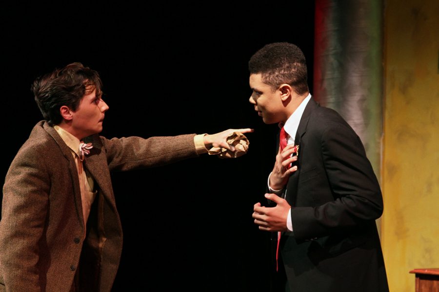 Senior Holden Pizzolato and Theo Abalogu act argue during the Black Box theater production of Once in a Lifetime with Holden as George, and Theo as Glogauer.