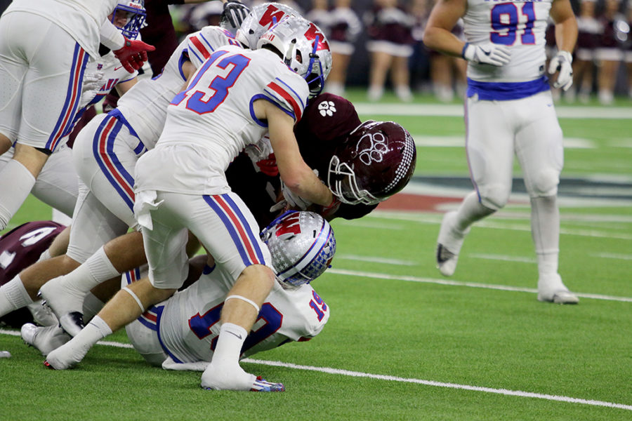 Westlake defensive line continue to push through and hold back Cy Fair from gaining yardage.

by Jake Breedlove
