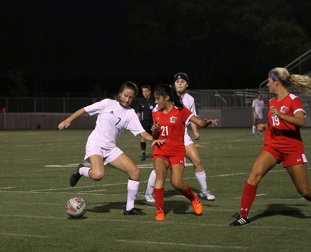 Sophomore Maddie Dawson steals a pass from an opponent during Westlake's April 6 playoff game vs Lake Travis.