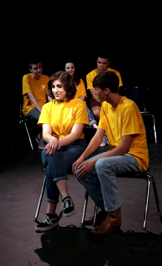 Sophomores Mina Mashhoon and Andrew Mountain play a game of Bus Stop at the last WIT show of the year. The improv group consists of Westlake students from sophomores to seniors.