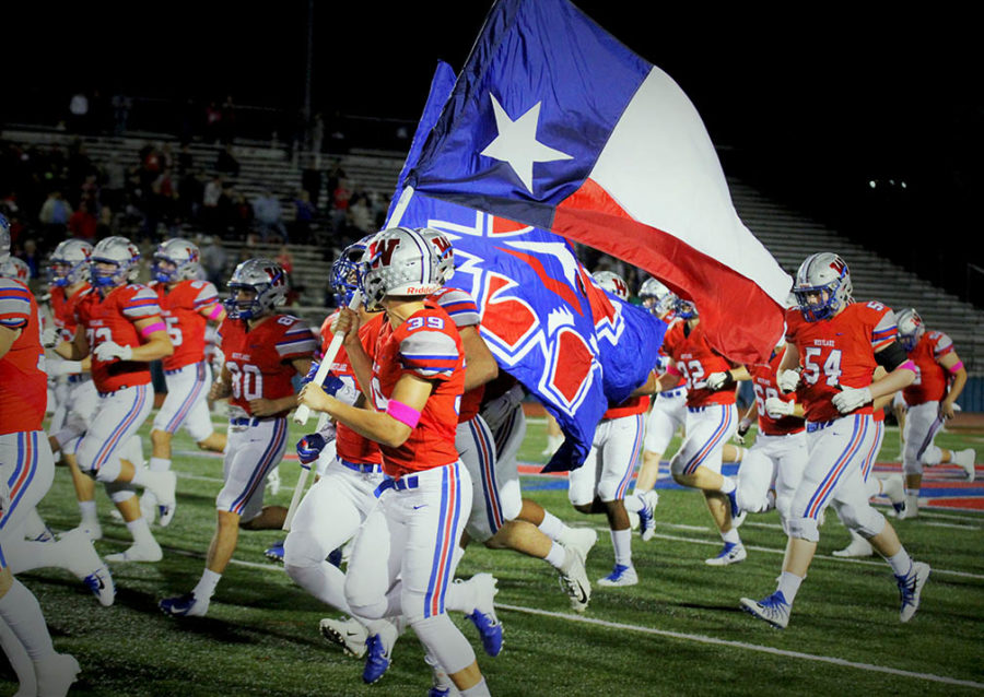 Westlake players run out onto the field ready to dominate the Hays game on October 26.