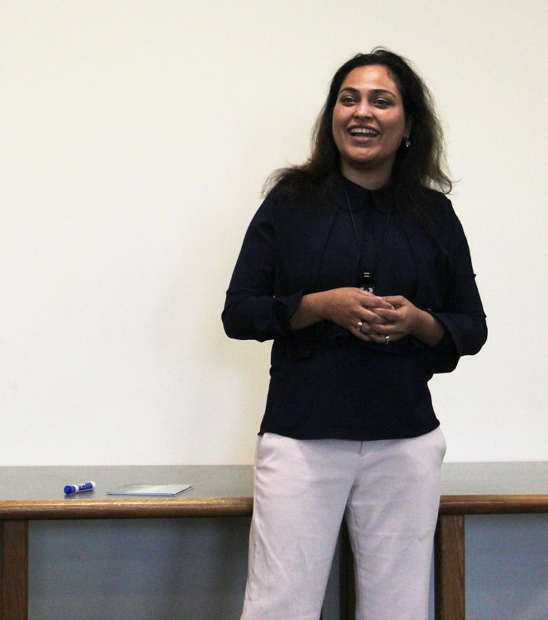 Speaker Afshan Khan gives a speech to parents at the Westbank Library on March 28. Her speech The Science to Overcoming Performance Anxiety helped to inform parents on ways to deal with anxiety felt by their children and what resources could be used to help them.