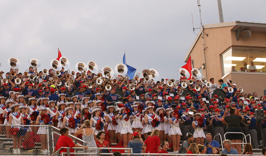 Middle school students participate in high school band