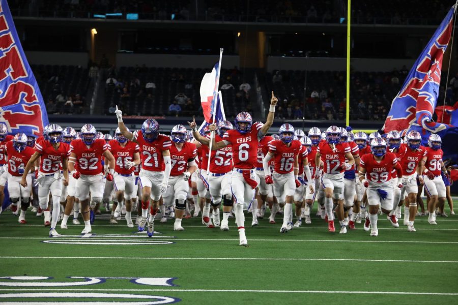 Westlake Chaps win 3rd consecutive state championships. Chaps running onto the field at AT&T stadium December, 18, 2021.