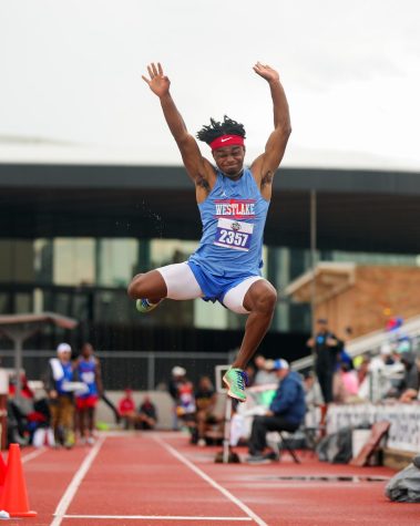 State champ wows in long jump