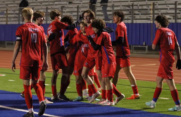 Chaps celebrate a goal in the first half of their 3-0 win over Lake Travis Wednesday. The win helps the Chaps maintain an undefeated record as they begin district play.  