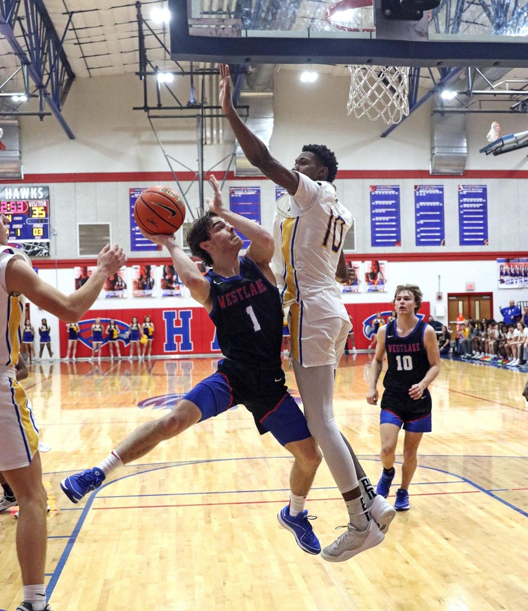 Guard senior Gavin Paull goes up for a layup in the Chaps 42-37 win over Clemens Friday, Feb. 23 at Hays High School. Paull scored 15 points, including five in the fourth quarter to help the Chaps to victory. 