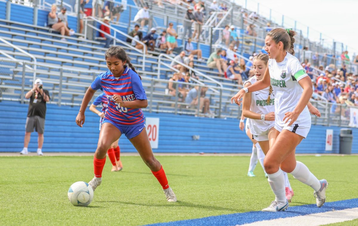 Forward junior Mia Berry dribbles around defenders in the Chaps 1-0 loss to Prosper in the UIL 6A Girls Soccer State Championship game at Birkelbach Field Saturday, April 13. The title game appearance was the first time the Chaps have made the championship since 1996. 