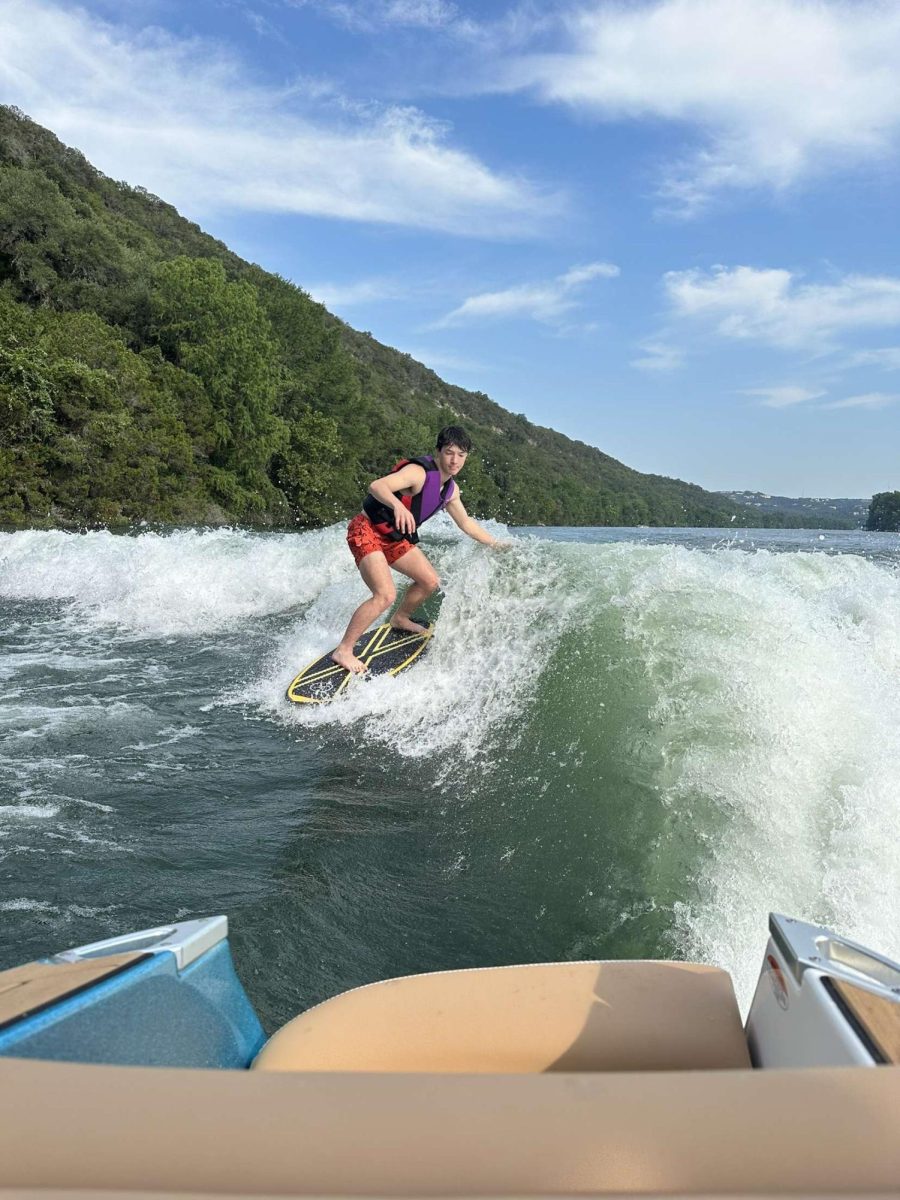Senior+Evan+ONeil+wake+surfs+on+Lady+Bird+Lake+Monday%2C+April+1.+Senior+Skip+Day+gave+him+the+opportunity+to+relax+and+spend+time+with+his+friends.%0A