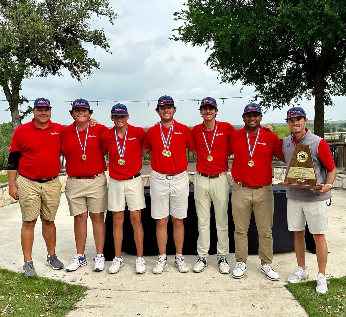 The+varsity+boys+golf+team+poses+for+a+photo+following+their+win+in+the+regional+championship+Wednesday%2C+April+17.+The+Chaps+will+go+for+a+seventh+consecutive+state+title+in+the+state+tournament+the+week+of+April+29.+