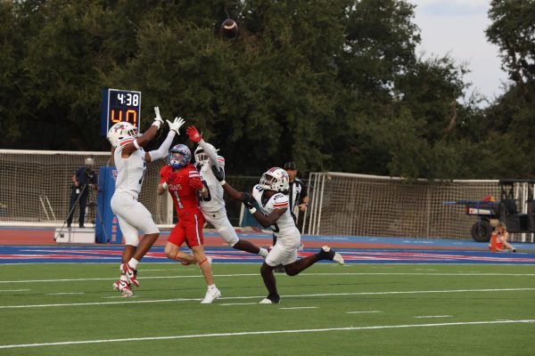 Junior wide receiver Lawson Grimes tries to track down the ball in triple coverage against Atascocita Sep. 13 at Chaparral Stadium. Grimes is the leading receiver for the Chaps through three games.  