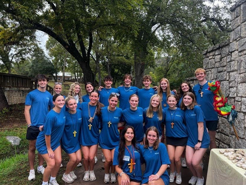 Senior Phoebe Lingan (front left) and junior Livia Neas (front right) pose with student staff members for a picture at Celebration 26 Sunday, Sept. 2. Lingan was the moderator for Celebration 26, while Neas was the observing moderator and will lead Celebration 27.