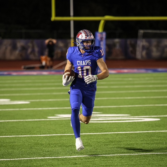 Senior wide receiver Cal Livengood runs downfield against Bowie at Chaparral Stadium Oct. 18. Livengood lead the offense with 115 yards from scrimmage. 