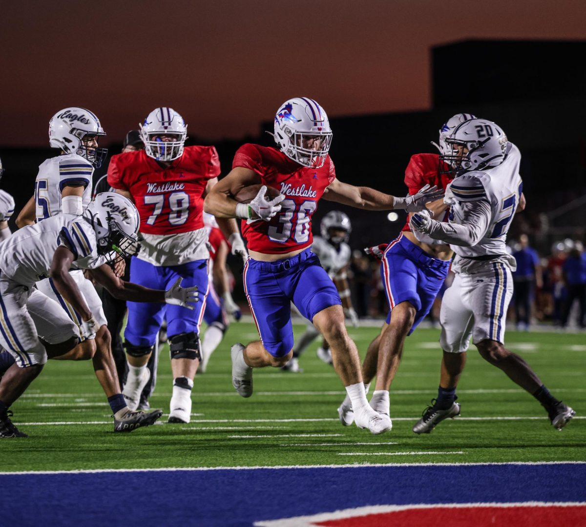 Senior running back Grady Bartlett cuts right on a run against Akins Oct. 3 at Chaparral Stadium. The Chaps took home a 70-0 win, moving to 1-0 in the district.  