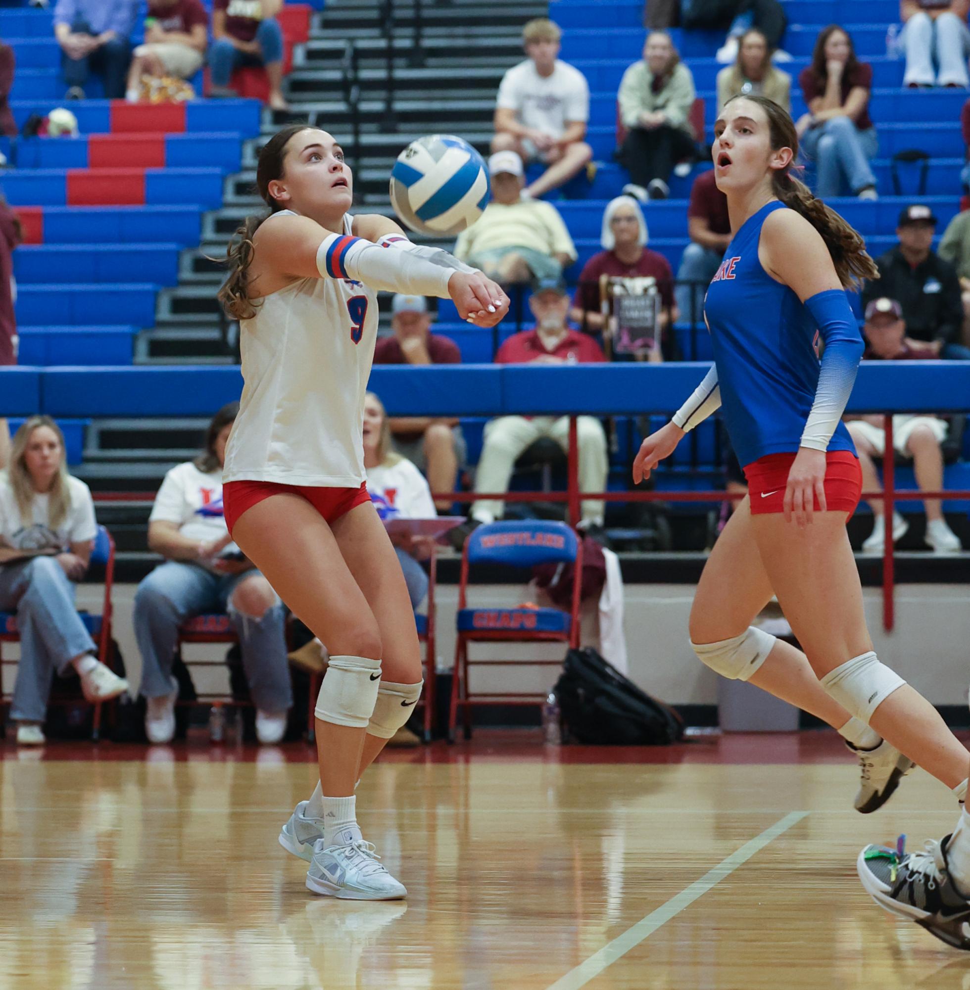 Senior libero Mallory Weyand sets the ball against Dripping Springs Oct. 15 on Al Bennett Court. The Chaps lost their second match of the year against the Tigers 3-1