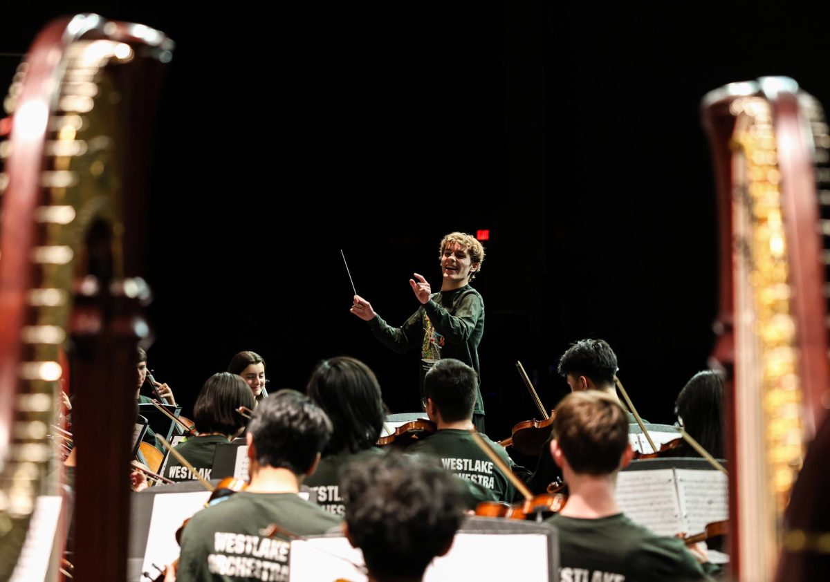 Chaps Orchestra rehearses Nov. 20, 2024 with the Technical Entertainment Crew (TEC) to prepare for the Nutcracker Spectacular. Although the orchestra plays most of the music live, TEC recorded the orchestra playing the overture for the Nutcracker Spectacular, which will be played at the beginning of the six shows, Dec. 12 to 15. 