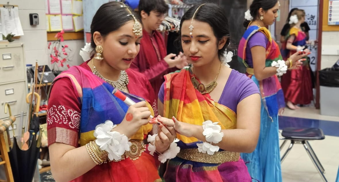 Sophomores Tara Srinivasan and Caty Meza get ready backstage at Black Box Theatre Jan. 24, 2024.