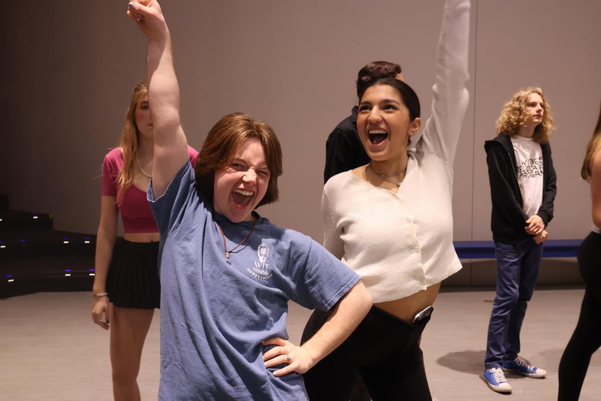 Leads Lance Prosise and Gaby Terrazas practice the ending dance of "Mamma Mia" Jan 31 in the Recital Hall.