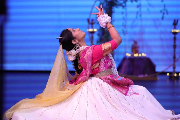 Dawned in pink and white fabric, sophomore Adrita Roy portrays Rhada in Nritya Mandala’s performance of Shringar at Black Box Theatre, Jan. 24, 2024. The production marks the second performance by the South Asian dance club at the Black Box Theatre.