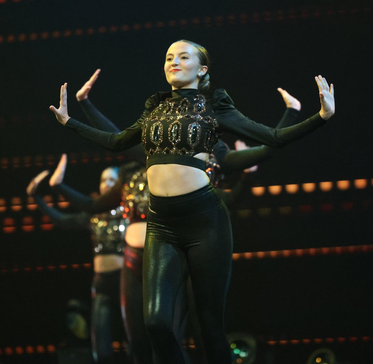 Junior Syndey Stasio dances to "Pump it up" April 25 at Zenith's opening night.