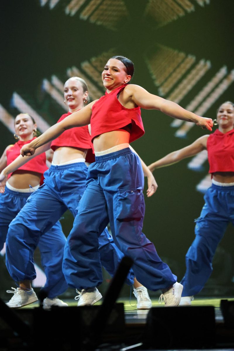 Funky Co team members seniors Anna Powell Ryan Limburg perform in Zenith April 26.