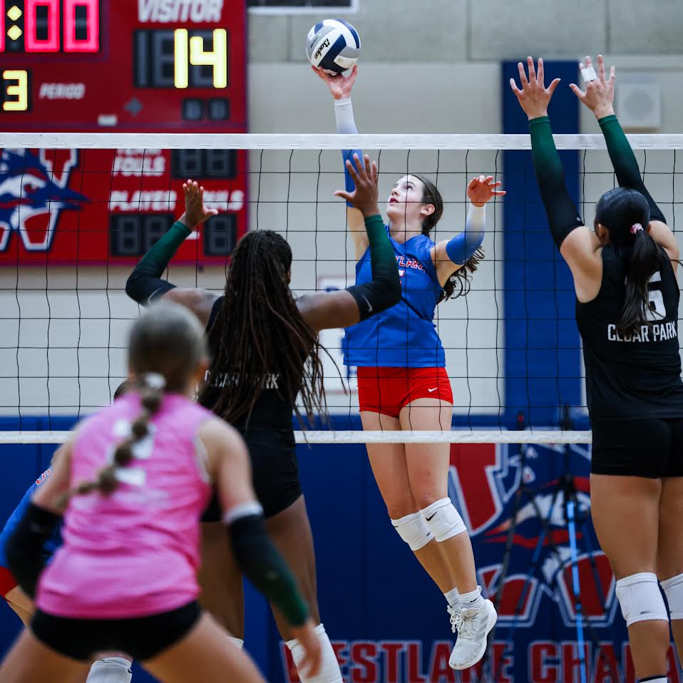 Senior Outside Hitter Chloe Kelly kills the ball against Cedar Park Aug. 26 at Al Bennett Court. Despite a Chaparral loss, Kelly reached 1000 career kills during the match.