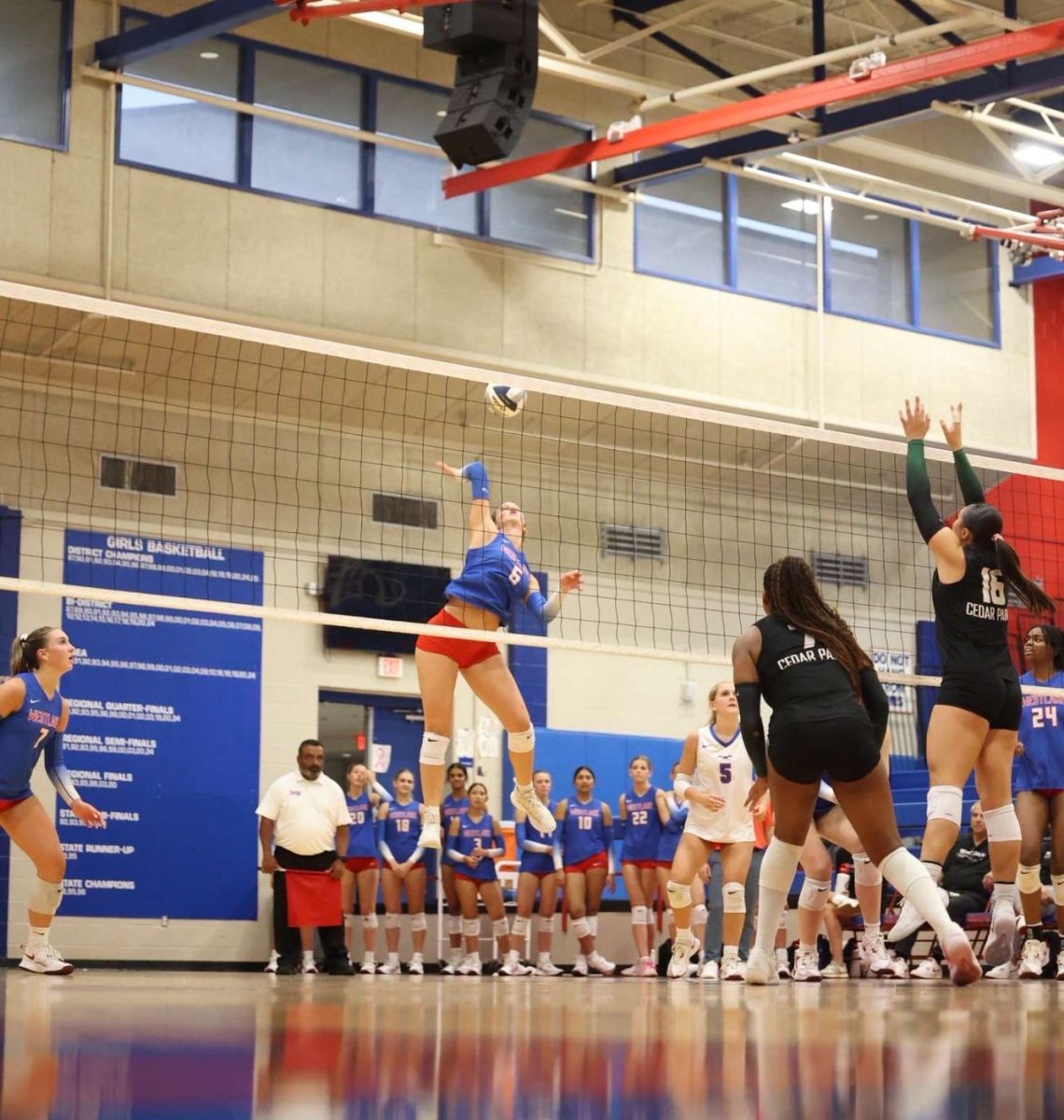 Senior Outside Hitter Chloe Kelly kills the ball against Cedar Park Aug. 26 at Al Bennett Court. Despite a Chaparral loss, Kelly reached 1000 career kills during the match.