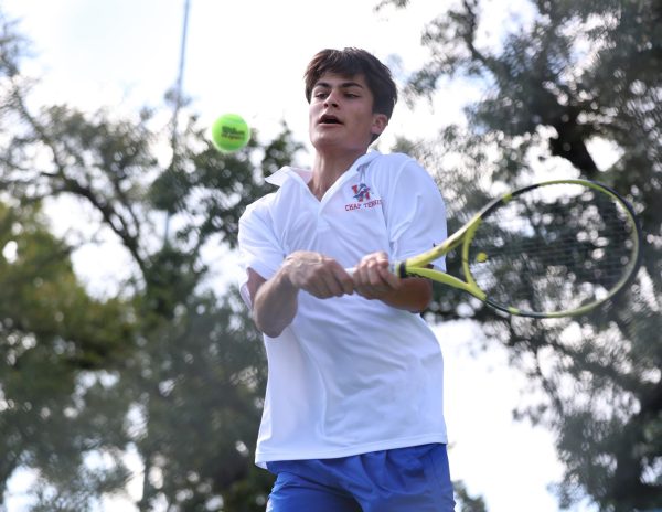 Senior Daniel Holzer competes in his singles match Thursday at Westlake against Westwood. Holzer took two of the Chaps three wins on the day.