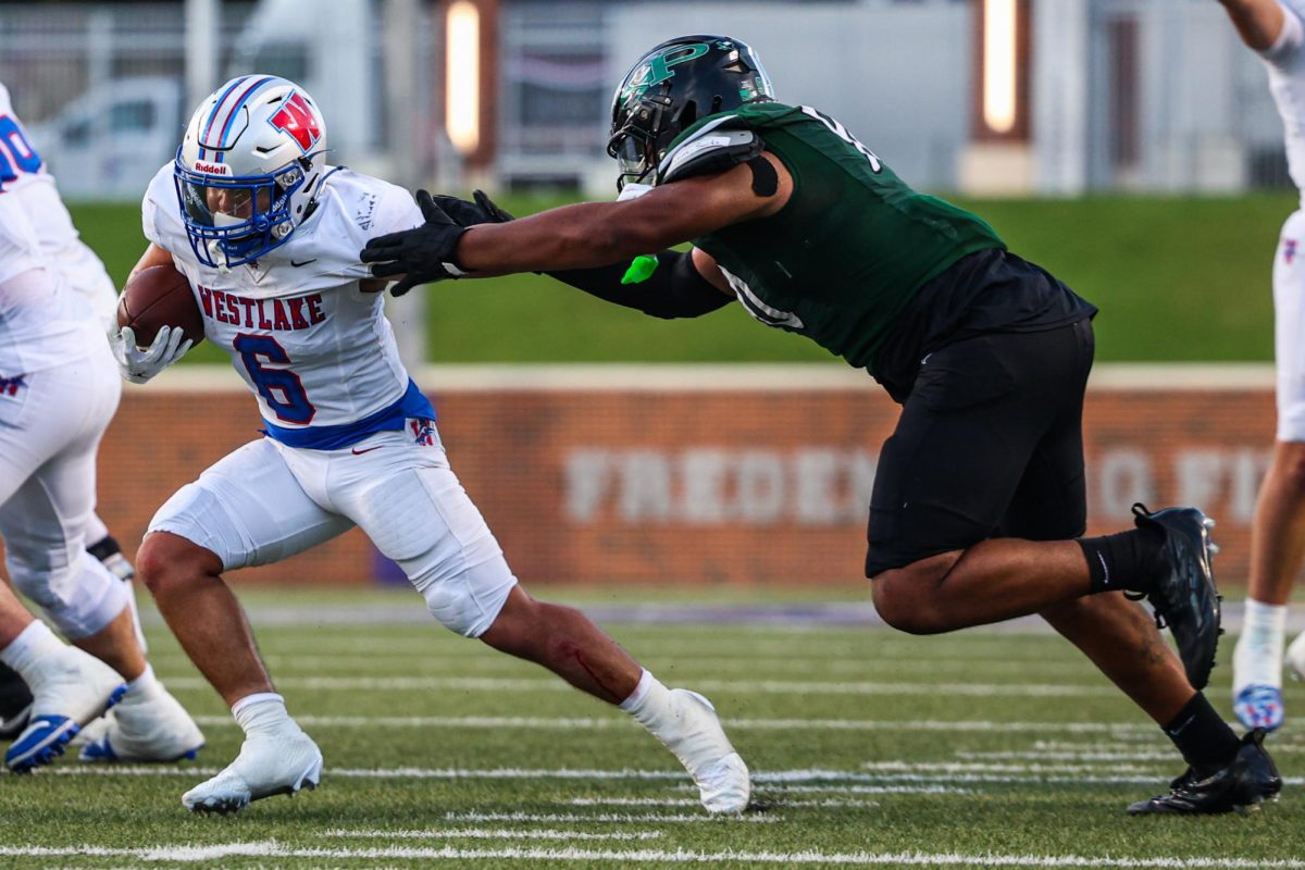 Defense in pursuit, running back sophomore Jaren Lopez scrambles into the end zone for the first touchdown of Westlake’s season Aug. 29. The Chaps fell 22-29 to the Prosper Eagles.