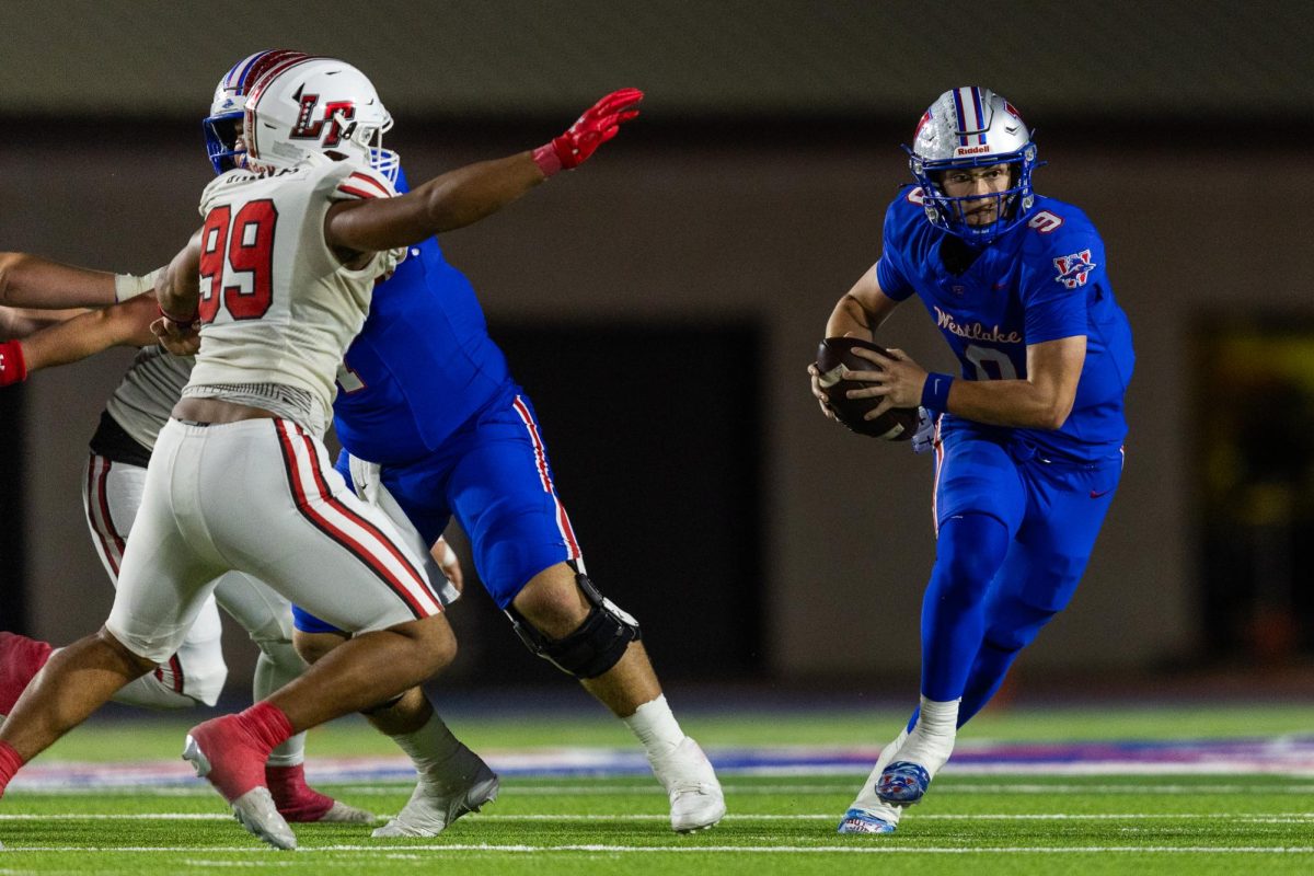 Senior quarterback Rees Wise escapes pressure during the Westlake Chaparrals loss to the Lake Travis Cavaliers on Oct. 24 at Chaparral Stadium. (Joe Nogalski/Westlake Featherduster)