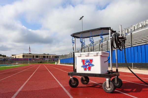 A Westlake Sports Medicine water cow sits on the sideline at Chaparral Stadium Oct. 23. 
