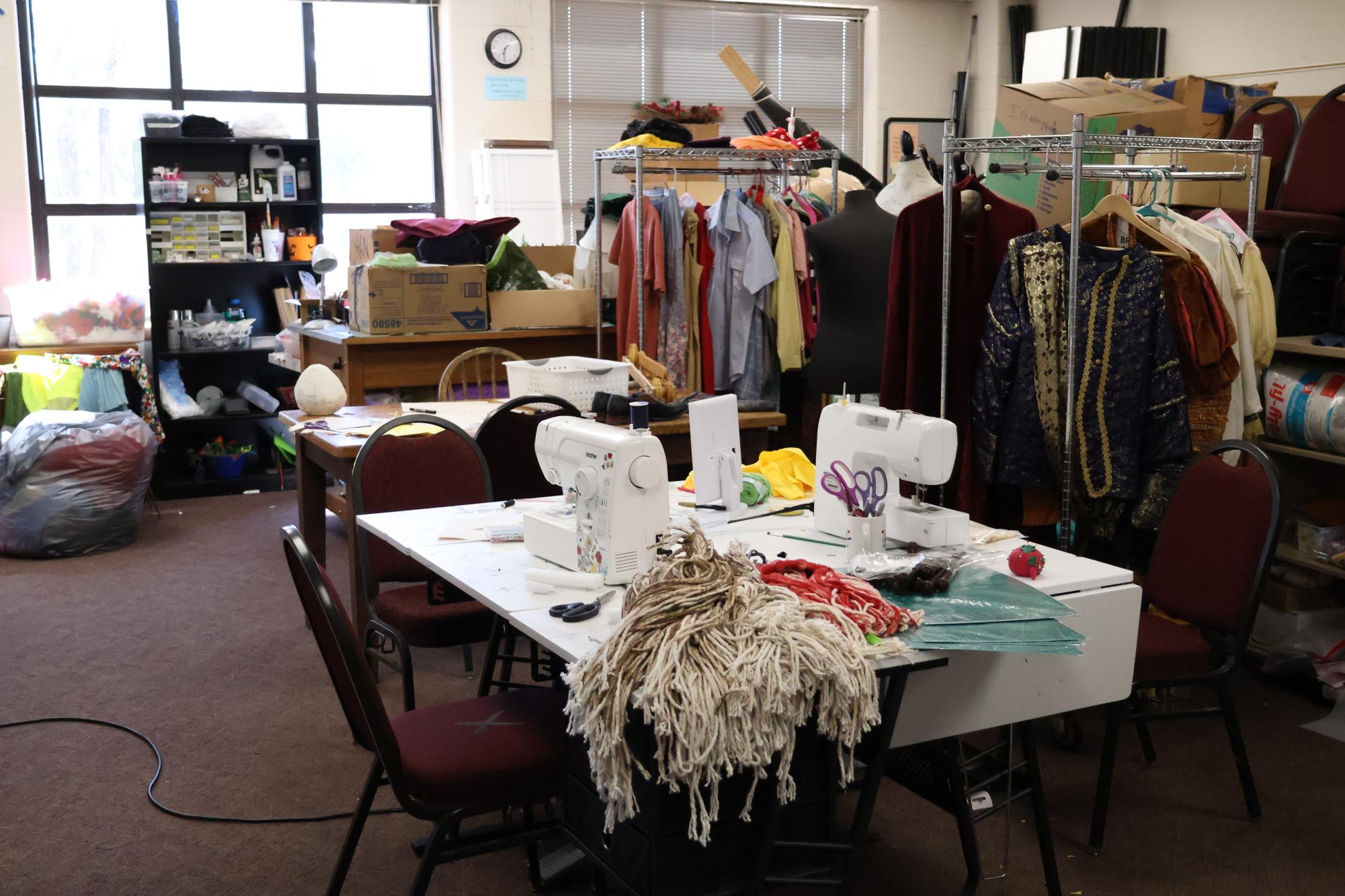 A look into the Death Star, a room in which Props and Costumes work on their projects. Hermeoone’s wigs for Puffs are on the sewing table.