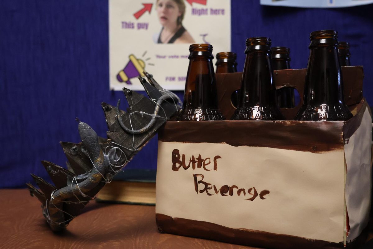 Props created for Puffs. A snake crown for the characters and the famous ‘Butter Beverage’.