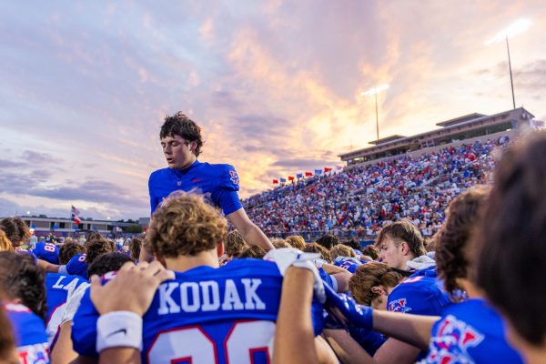 Senior quarterback Rees Wise says a prayer with the rest of the Chaparral team prior to the Chaparrals loss to the Lake Travis Cavaliers Oct. 24 at Chaparral Stadium