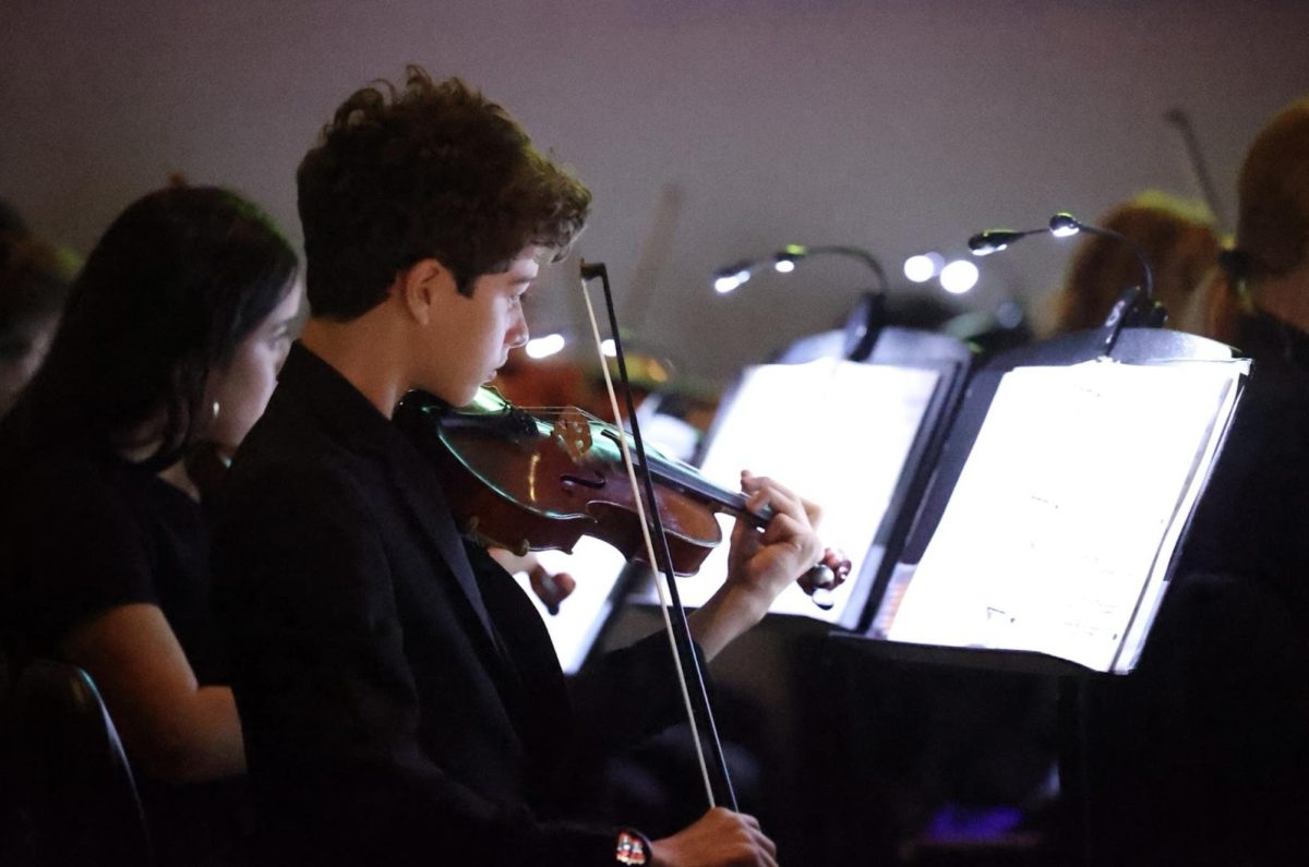 Sophomore Jacob Yatim playing alongside the silent film “Nosferatu” in the recital hall Oct. 30.