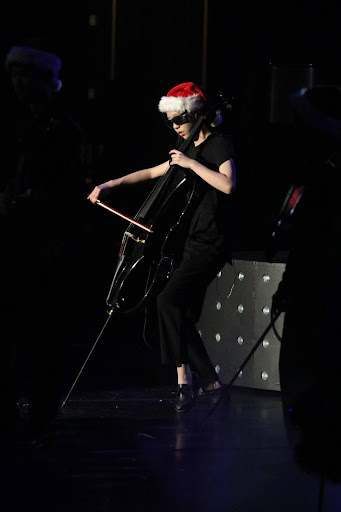 Senior cellist Mia Chang playing on the rock show at the end of the Dec. 12 “Nutcracker Spectacular”. 