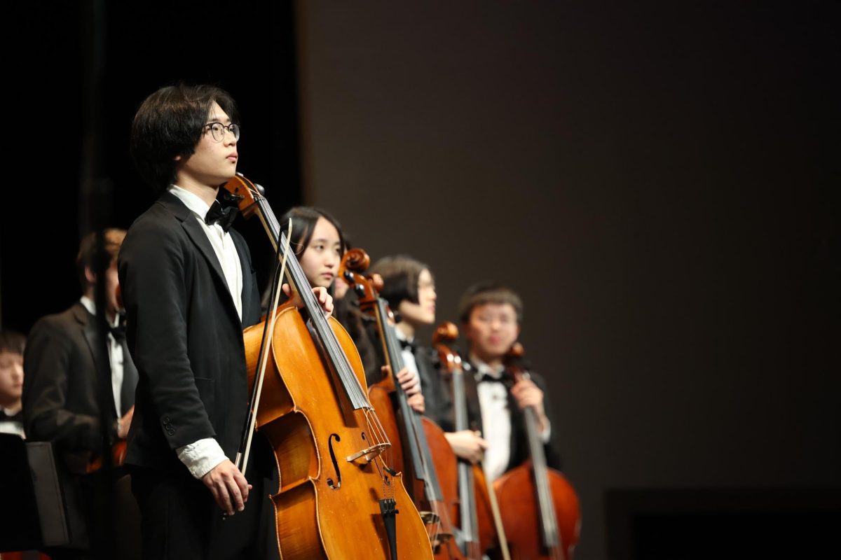 Senior Yujin Son holding his cello after he preformed at the orchestras pre-UIL concert on Feb. 18. The Chaps' Chamber, Sinfonietta, Philharmonic and Symphony orchestras, and middle school orchestras, preformed their UIL pieces to prepare for their competition on Feb. 18. The full orchestra UIL competition takes place on March 5.