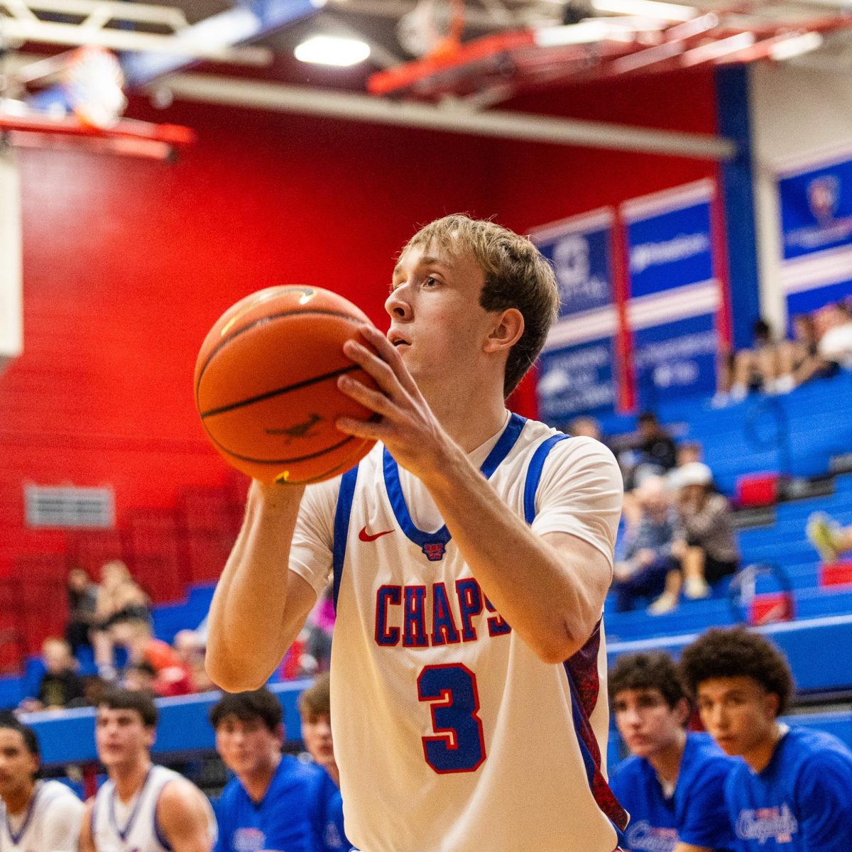 Senior guard Blake Cannatti attempts a 3-pointer against Akins Feb. 17 at Al Bennett Court. (Joe Nogalski/Westlake Featherduster)