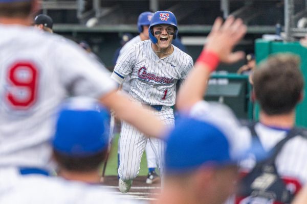 Junior center fielder Lane Johnson celebrates after an inside-the-park home run in the Chaps 6-0 win over the O'Connor Panthers May 8 at Texas State University.